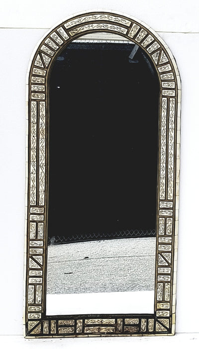 A pair of vintage white bone mirrors